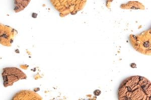 homemade chocolate chips cookies on white background in top view