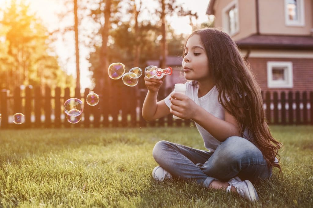 Little girl on backyard