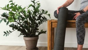 person sitting on gray chair