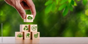 concept of carbon credit reducing carbon emissions Zero net greenhouse gas emissions target Carbon credits to invest in sustainable businesses green climate investment wooden block with green icon