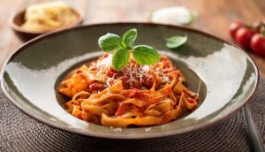 Assiette de pâtes bolognaises - crédit photo : Janet via Adobe Stock