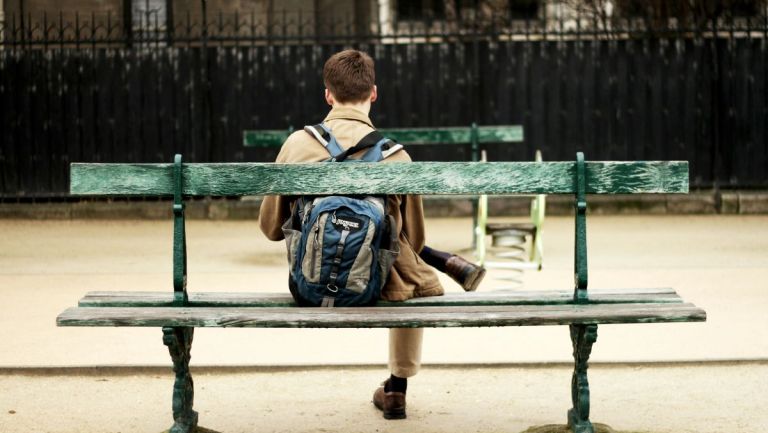 Person sitting on a bench