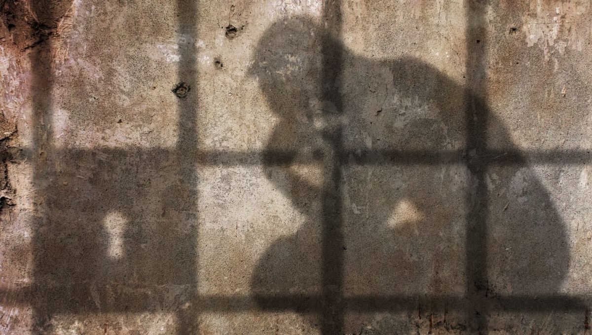 L'ombre d'un homme en prison.