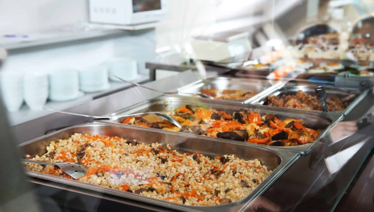Containers with healthy food in school canteen