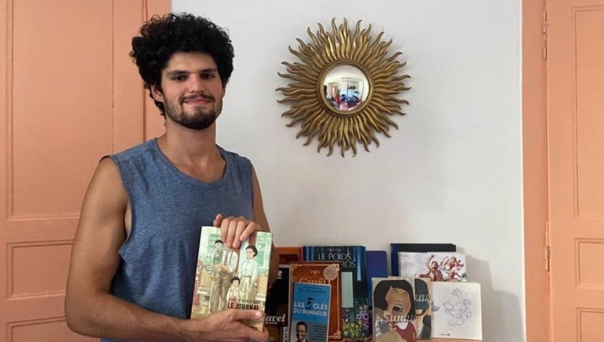 Théo et son livre Le journal de mon père de Jiro Taniguchi