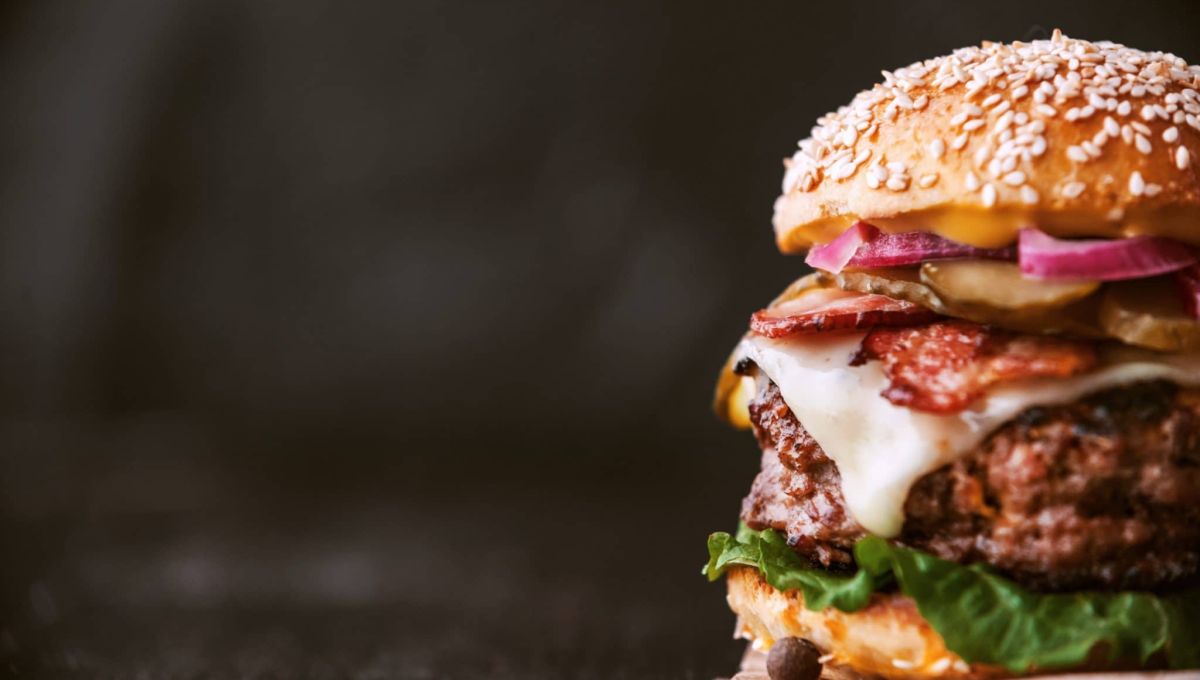 a delicious and juicy burger home in a rustic style with a big chop of beef
