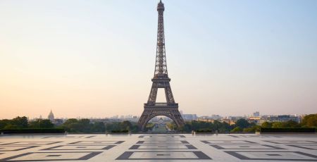 Eiffel tower, empty Trocadero, nobody in a clear summer morning in Paris, France