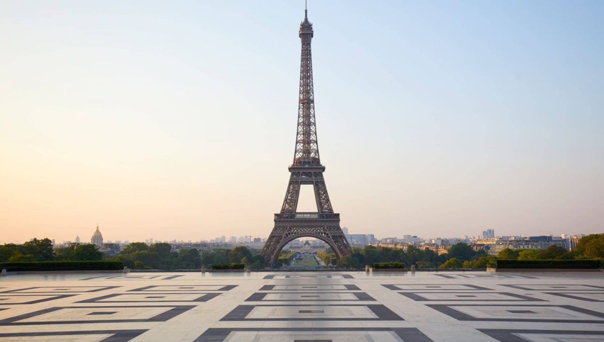 Eiffel tower, empty Trocadero, nobody in a clear summer morning in Paris, France