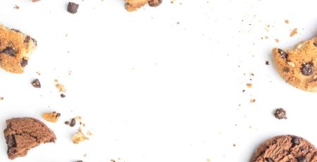 homemade chocolate chips cookies on white background in top view