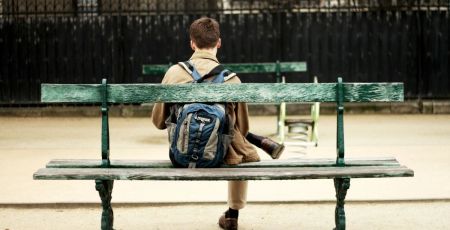 Person sitting on a bench