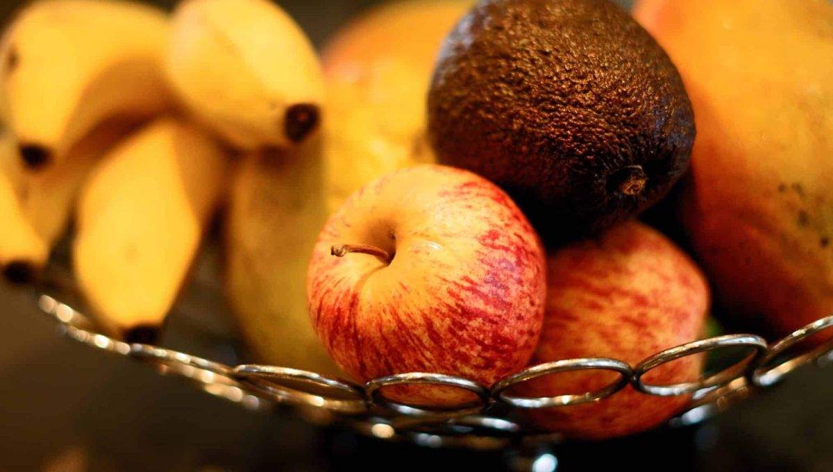 red apple fruit beside yellow banana fruit