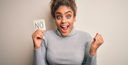 Young african american girl holding reminder paper with no word negative message screaming proud and celebrating victory and success very excited, cheering emotion