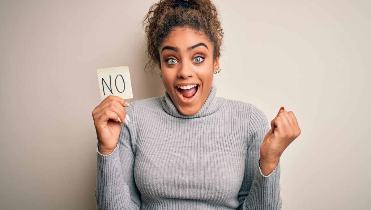 Young african american girl holding reminder paper with no word negative message screaming proud and celebrating victory and success very excited, cheering emotion